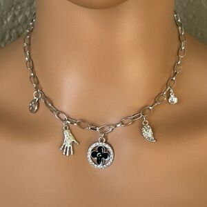 Stylish Silver Charm Necklace with Black Clover Pendant